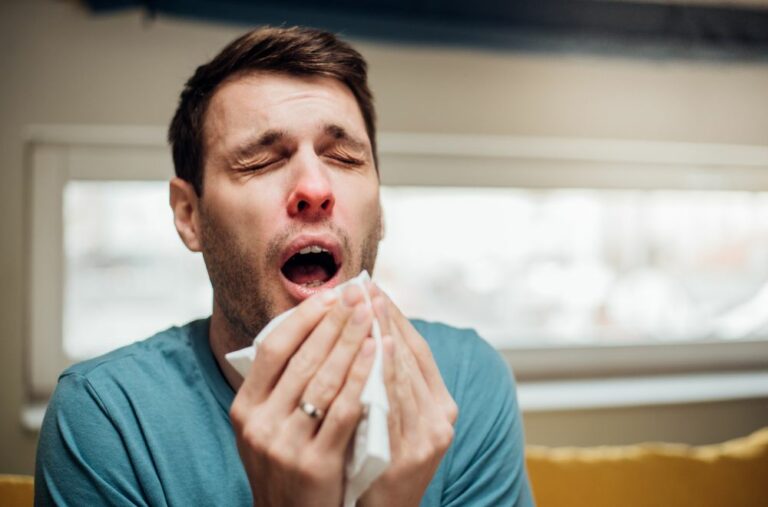 11 Spiritual Meanings of Sneezing